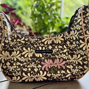 Petunia Pickle Bottom diaper bag in brown and cream print